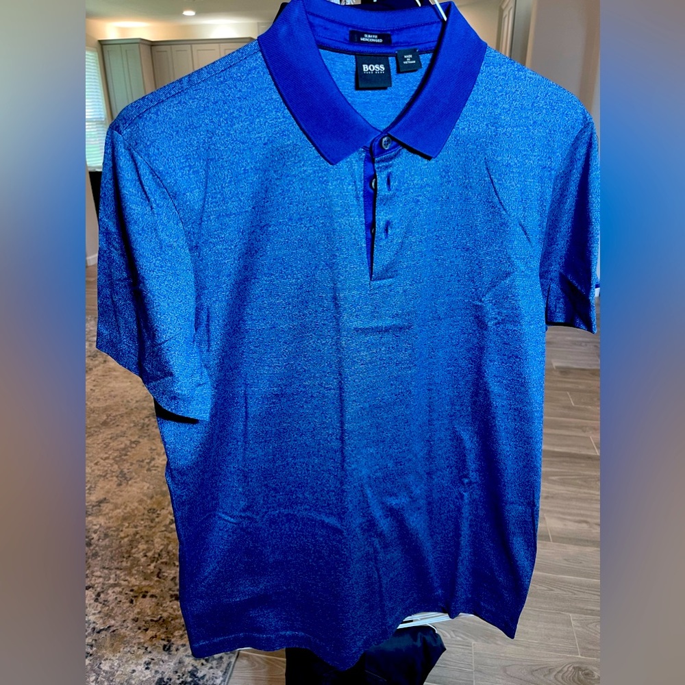 Boss polos size L. In great condition barely worn.